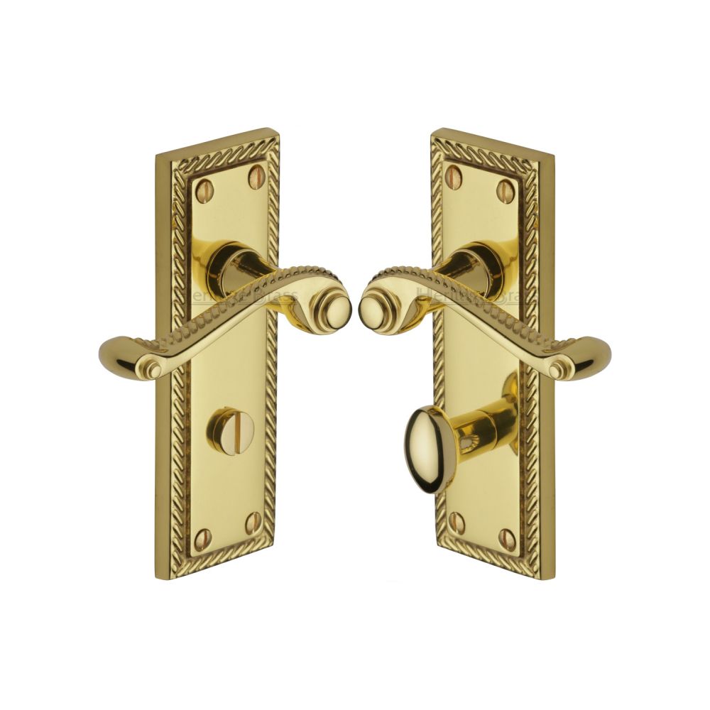 This is an image of a Heritage Brass - Door Handle for Bathroom Georgian Design Polished Brass Finish, g050-pb that is available to order from T.H Wiggans Ironmongery in Kendal.