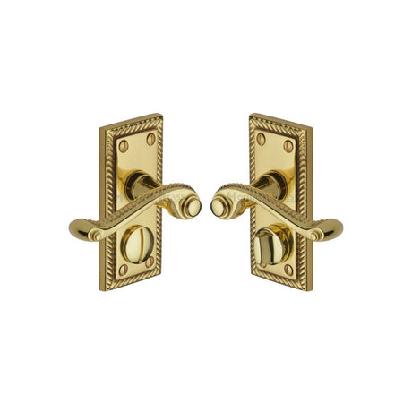 This is an image of a Heritage Brass - Door Handle for Privacy Set Georgian Short Design Polished Brass Fi, g055-pb that is available to order from T.H Wiggans Ironmongery in Kendal.