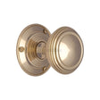 This is an image of a Heritage Brass - Mortice Knob on Rose Goodrich Design Polished Brass Finish, goo986-pb that is available to order from T.H Wiggans Ironmongery in Kendal.