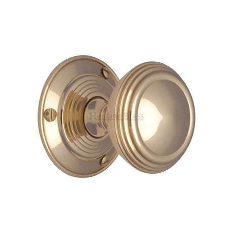 This is an image of a Heritage Brass - Mortice Knob on Rose Goodrich Design Polished Brass Finish, goo986-pb that is available to order from T.H Wiggans Ironmongery in Kendal.