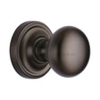This is an image of a Heritage Brass - Mortice Knob on Rose Hampstead Design Matt Bronze Finish, ham8361-mb that is available to order from T.H Wiggans Ironmongery in Kendal.
