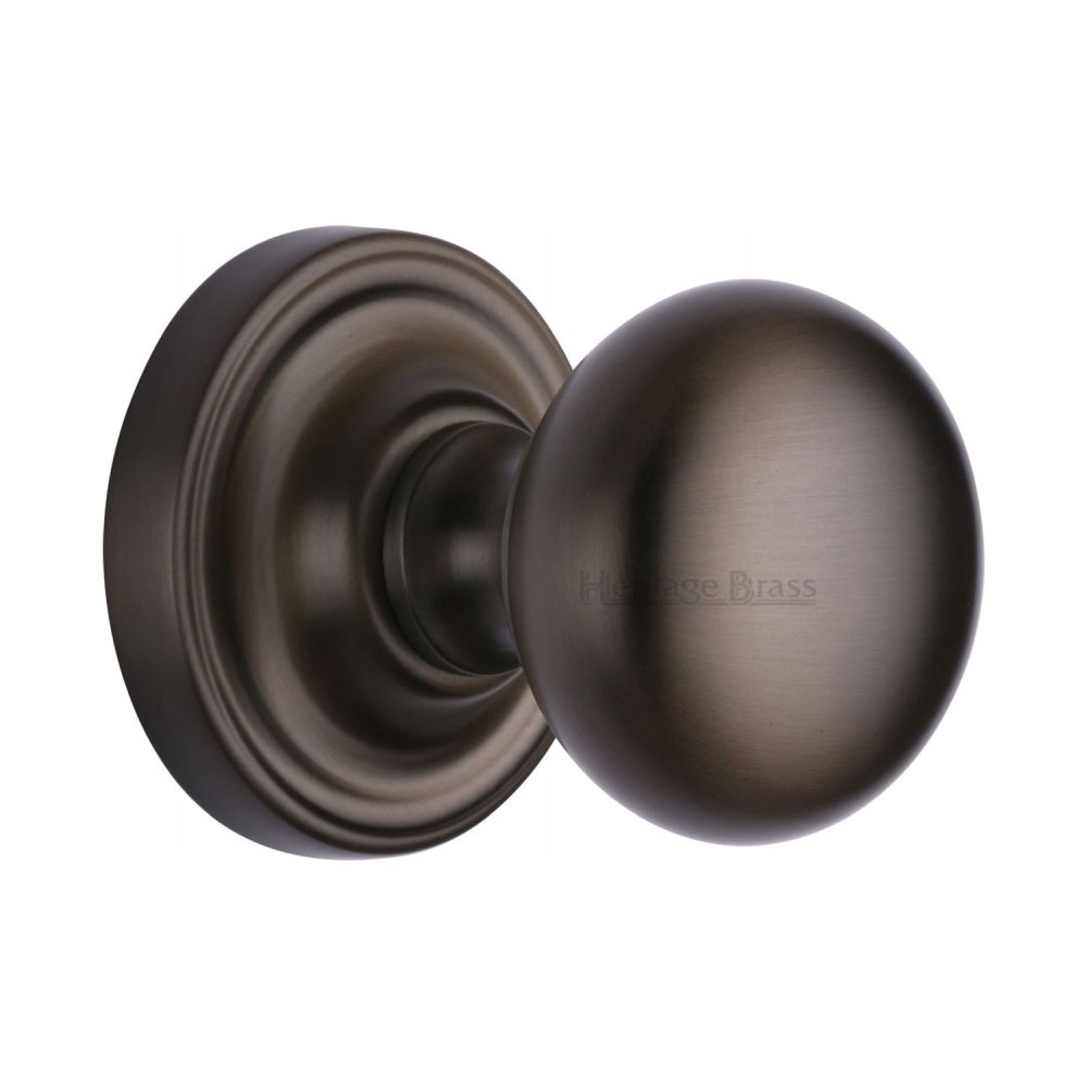 This is an image of a Heritage Brass - Mortice Knob on Rose Hampstead Design Matt Bronze Finish, ham8361-mb that is available to order from T.H Wiggans Ironmongery in Kendal.