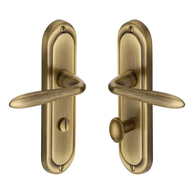 This is an image of a Heritage Brass - Door Handle for Bathroom Henley Design Antique Brass Finish, hen1230-at that is available to order from T.H Wiggans Ironmongery in Kendal.