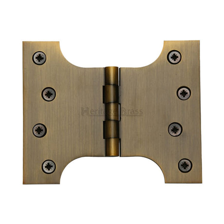 This is an image of a Heritage Brass - Parliament Hinge Brass 4" x 3" x 5" Antique Brass Finish, hg99-390-at that is available to order from T.H Wiggans Ironmongery in Kendal.