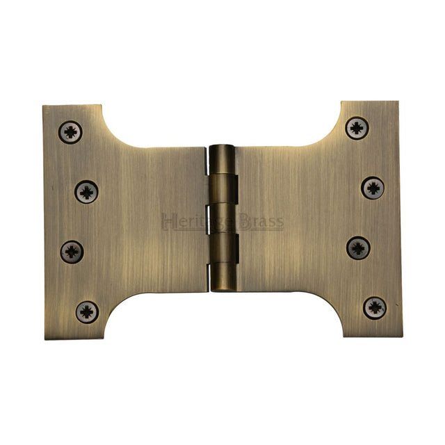 This is an image of a Heritage Brass - Parliament Hinge Brass 4" x 4" x 6" Antique Brass Finish, hg99-395-at that is available to order from T.H Wiggans Ironmongery in Kendal.