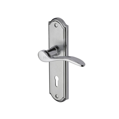 This is an image of a Heritage Brass - Door Handle Lever Lock Howard Design Apollo Finish, how1300-ap that is available to order from T.H Wiggans Ironmongery in Kendal.