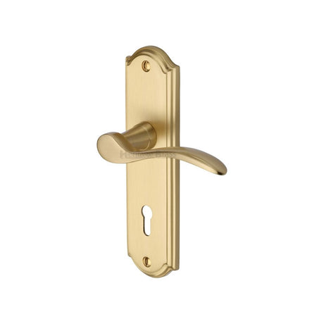 This is an image of a Heritage Brass - Door Handle Lever Lock Howard Design Satin Brass Finish, how1300-sb that is available to order from T.H Wiggans Ironmongery in Kendal.