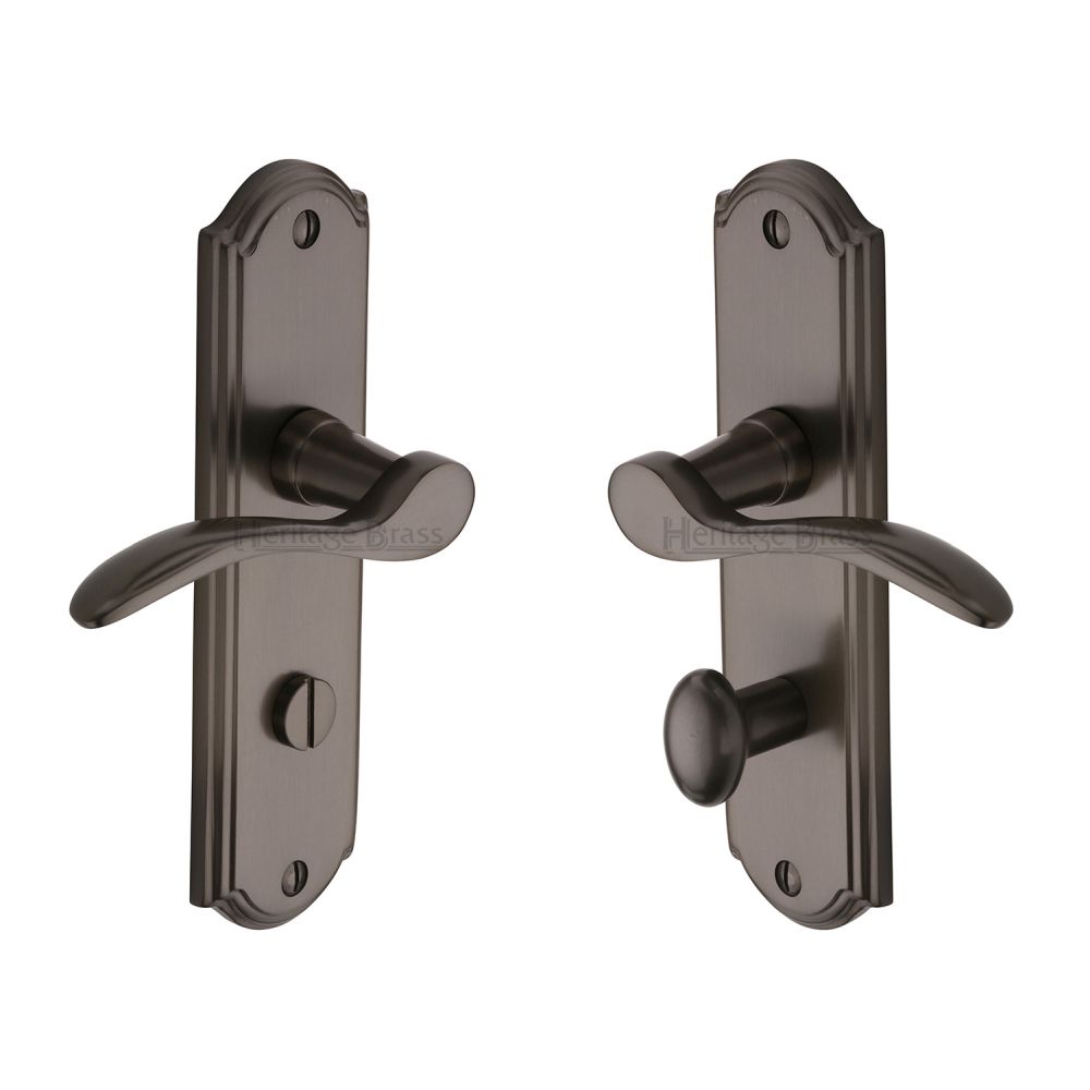 This is an image of a Heritage Brass - Door Handle for Bathroom Howard Design Matt Bronze Finish, how1330-mb that is available to order from T.H Wiggans Ironmongery in Kendal.