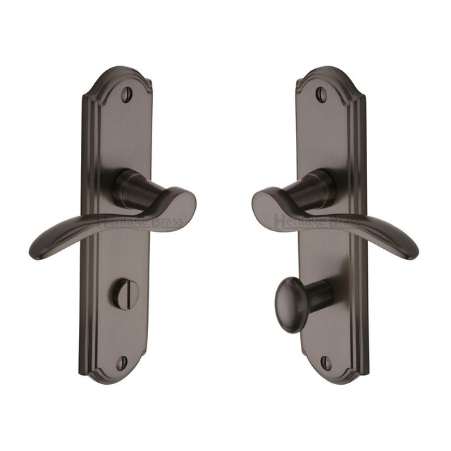 This is an image of a Heritage Brass - Door Handle for Bathroom Howard Design Matt Bronze Finish, how1330-mb that is available to order from T.H Wiggans Ironmongery in Kendal.