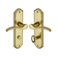 This is an image of a Heritage Brass - Door Handle for Bathroom Howard Design Polished Brass Finish, how1330-pb that is available to order from T.H Wiggans Ironmongery in Kendal.