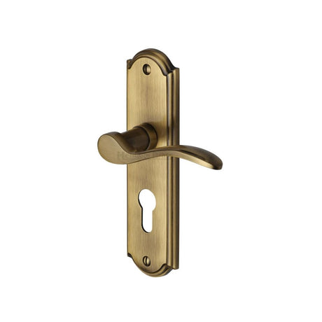 This is an image of a Heritage Brass - Door Handle for Euro Profile Plate Howard Design Antique Brass Fin, how1348-at that is available to order from T.H Wiggans Ironmongery in Kendal.