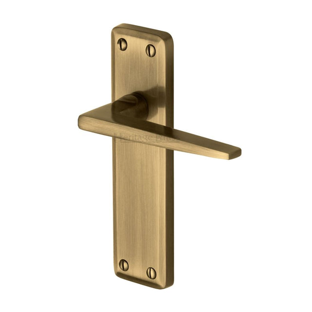 This is an image of a Heritage Brass - Door Handle Lever Latch Kendal Design Antique Brass Finish, ken6810-at that is available to order from T.H Wiggans Ironmongery in Kendal.