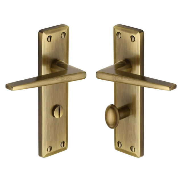 This is an image of a Heritage Brass - Door Handle for Bathroom Kendal Design Antique Brass Finish, ken6830-at that is available to order from T.H Wiggans Ironmongery in Kendal.