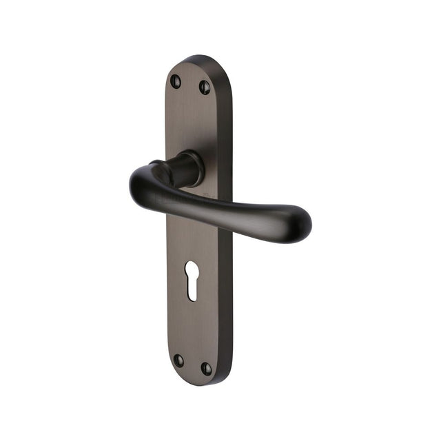 This is an image of a Heritage Brass - Door Handle Lever Lock Luna Design Matt Bronze Finish, lun5300-mb that is available to order from T.H Wiggans Ironmongery in Kendal.