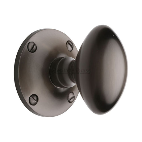 This is an image of a Heritage Brass - Mortice Knob on Rose Mayfair Design Matt Bronze Finish, may960-mb that is available to order from T.H Wiggans Ironmongery in Kendal.