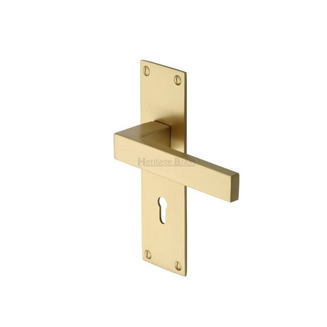 This is an image of a Heritage Brass - Door Handle Lever Lock Metro Design Satin Brass Finish, met4900-sb that is available to order from T.H Wiggans Ironmongery in Kendal.