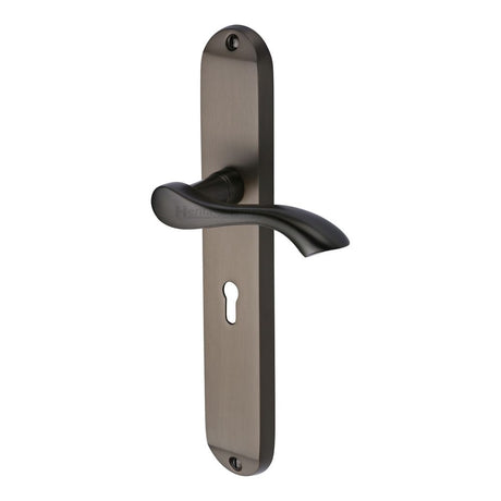 This is an image of a Heritage Brass - Door Handle Lever Lock Algarve Long Design Matt Bronze Finish, mm7200-mb that is available to order from T.H Wiggans Ironmongery in Kendal.