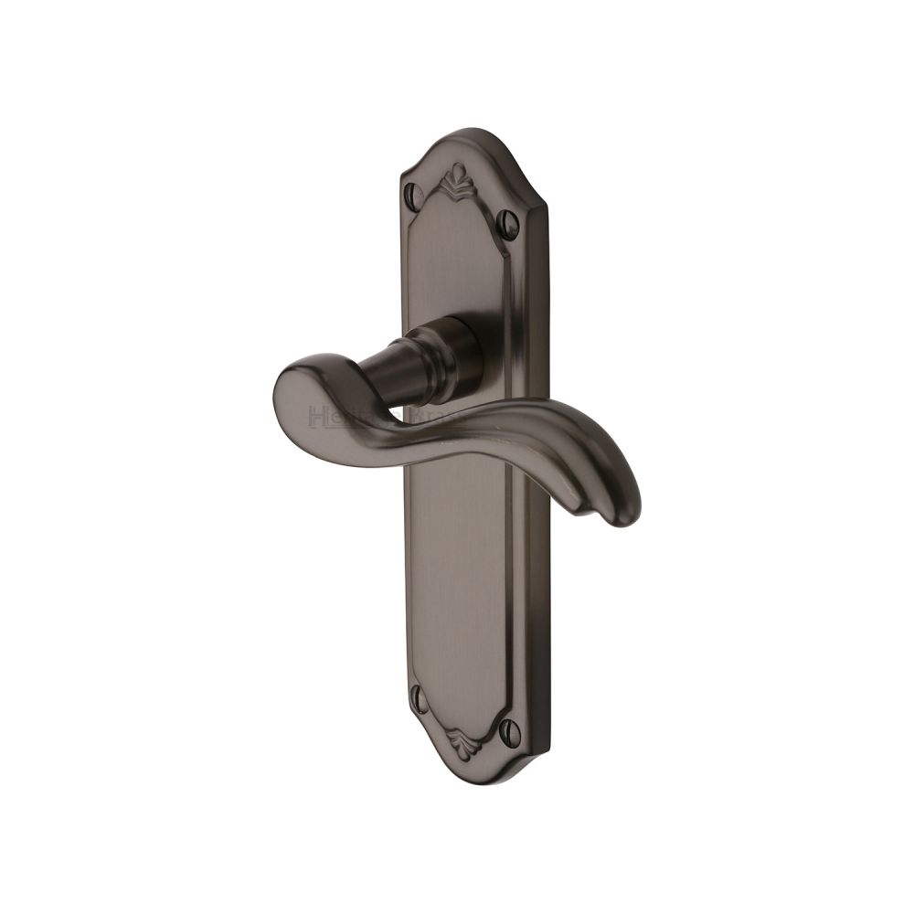 This is an image of a Heritage Brass - Door Handle Lever Latch Lisboa Design Matt Bronze Finish, mm992-mb that is available to order from T.H Wiggans Ironmongery in Kendal.
