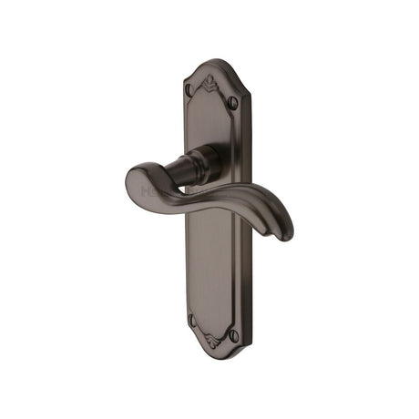 This is an image of a Heritage Brass - Door Handle Lever Latch Lisboa Design Matt Bronze Finish, mm992-mb that is available to order from T.H Wiggans Ironmongery in Kendal.