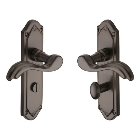 This is an image of a Heritage Brass - Door Handle for Bathroom Lisboa Design Matt Bronze Finish, mm993-mb that is available to order from T.H Wiggans Ironmongery in Kendal.