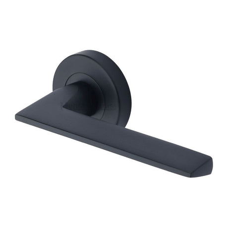 This is an image of a Heritage Brass - Door Handle Lever Latch on Round Rose Pyramid Design Matt Black, pyd3535-bkmt that is available to order from T.H Wiggans Ironmongery in Kendal.