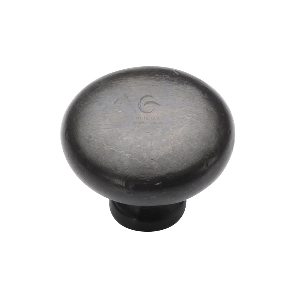 This is an image of a M.Marcus - Rustic Dark Bronze Cabinet Knob Round Design 32mm, rdb117-32 that is available to order from T.H Wiggans Ironmongery in Kendal.