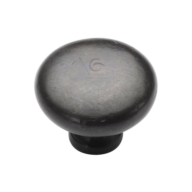 This is an image of a M.Marcus - Rustic Dark Bronze Cabinet Knob Round Design 38mm, rdb117-38 that is available to order from T.H Wiggans Ironmongery in Kendal.