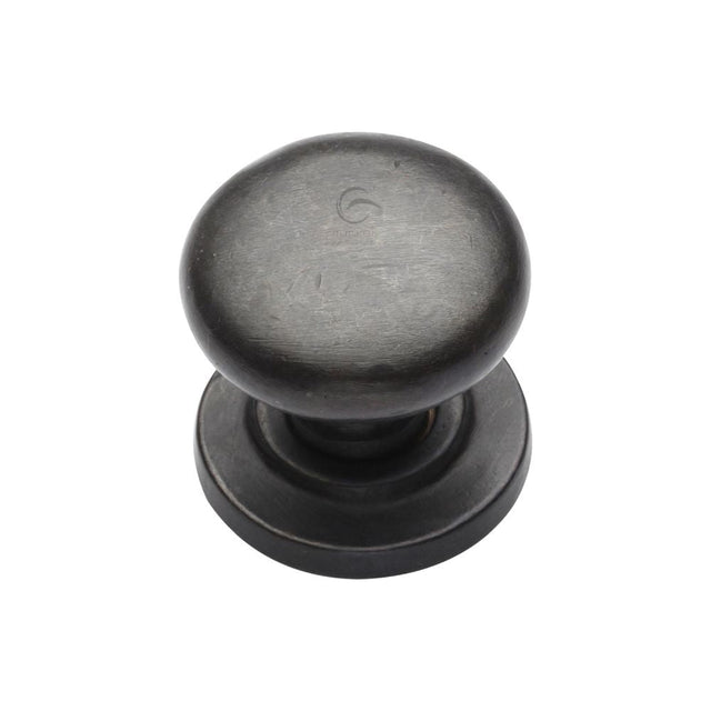 This is an image of a M.Marcus - Rustic Dark Bronze Cabinet Knob Round Design on Rose 32mm, rdb613-32 that is available to order from T.H Wiggans Ironmongery in Kendal.