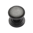 This is an image of a M.Marcus - Rustic Dark Bronze Cabinet Knob Round Design on Rose 38mm, rdb613-38 that is available to order from T.H Wiggans Ironmongery in Kendal.
