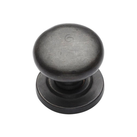 This is an image of a M.Marcus - Rustic Dark Bronze Cabinet Knob Round Design on Rose 38mm, rdb613-38 that is available to order from T.H Wiggans Ironmongery in Kendal.