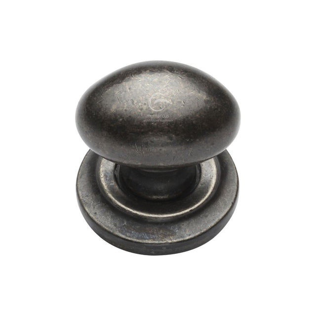 This is an image of a M.Marcus - Rustic Pewter Cabinet Knob Oval Design on Rose 32mm, rpw179-32 that is available to order from T.H Wiggans Ironmongery in Kendal.