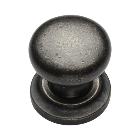 This is an image of a M.Marcus - Rustic Pewter Cabinet Knob Round Design on Rose 32mm, rpw613-32 that is available to order from T.H Wiggans Ironmongery in Kendal.