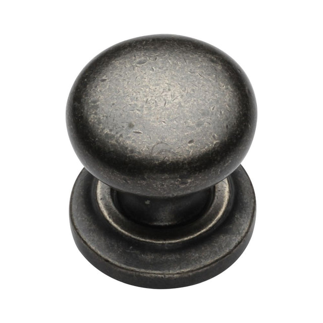 This is an image of a M.Marcus - Rustic Pewter Cabinet Knob Round Design on Rose 32mm, rpw613-32 that is available to order from T.H Wiggans Ironmongery in Kendal.
