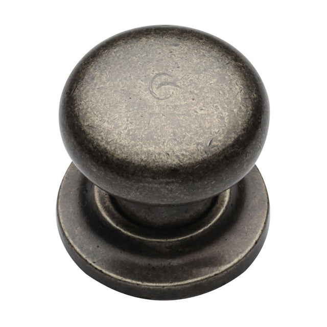 This is an image of a M.Marcus - Rustic Pewter Cabinet Knob Round Design on Rose 38mm, rpw613-38 that is available to order from T.H Wiggans Ironmongery in Kendal.