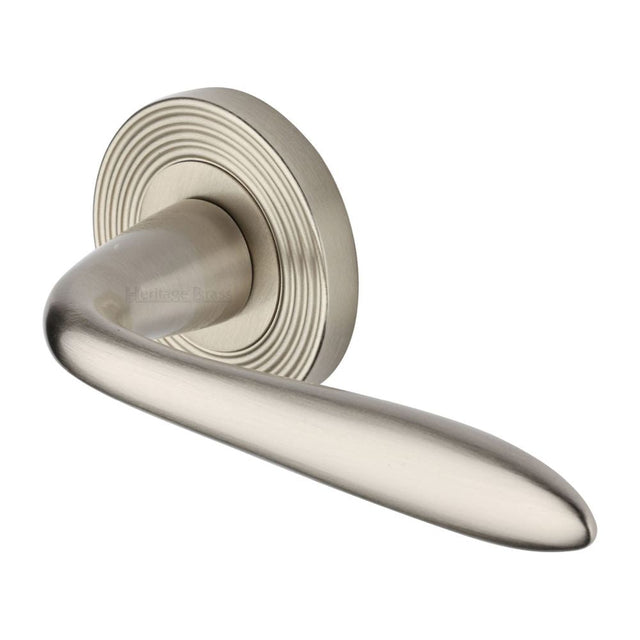 This is an image of a Heritage Brass - Door Handle Lever Latch on Round Rose Sutton Reeded Design Satin, rr1752-sn that is available to order from T.H Wiggans Ironmongery in Kendal.