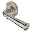 This is an image of a Heritage Brass - Door Handle Lever Latch on Round Rose Bridgetown Reeded Design, rr1935-sn that is available to order from T.H Wiggans Ironmongery in Kendal.