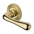 This is an image of a Heritage Brass - Door Handle Lever Latch on Round Rose Charlbury Reeded Design P, rr3022-pb that is available to order from T.H Wiggans Ironmongery in Kendal.