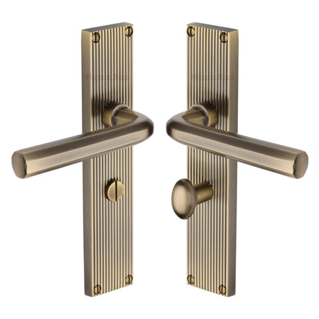 This is an image of a Heritage Brass - Octave Reeded Bathroom Set Antique Brass finish, rr3730-at that is available to order from T.H Wiggans Ironmongery in Kendal.