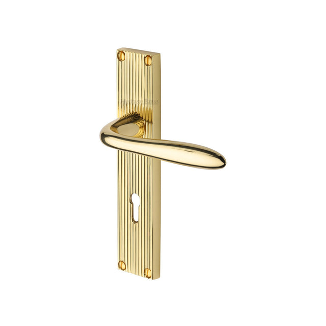 This is an image of a Heritage Brass - Sutton Reeded Lever Lock Polished Brass finish, rr5000-pb that is available to order from T.H Wiggans Ironmongery in Kendal.