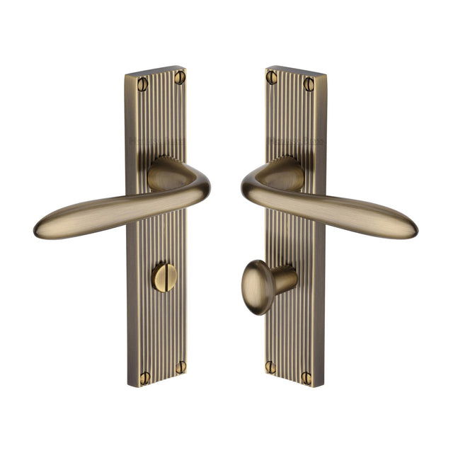 This is an image of a Heritage Brass - Sutton Reeded Bathroom set Antique Brass finish, rr5030-at that is available to order from T.H Wiggans Ironmongery in Kendal.