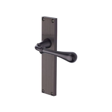 This is an image of a Heritage Brass - Roma Reeded Lever Latch Matt Bronze finish, rr6010-mb that is available to order from T.H Wiggans Ironmongery in Kendal.