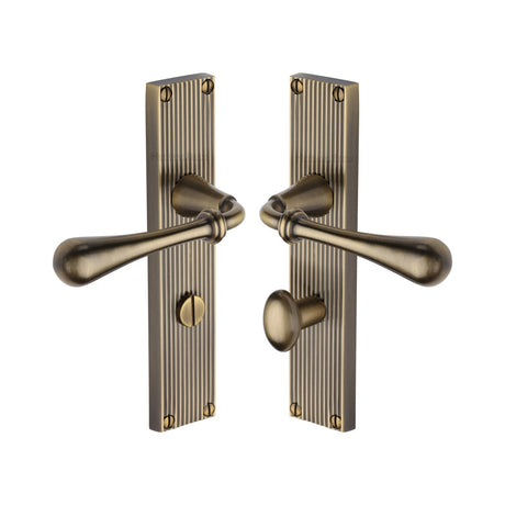 This is an image of a Heritage Brass - Roma Reeded Bathroom set Antique Brass finish, rr6030-at that is available to order from T.H Wiggans Ironmongery in Kendal.