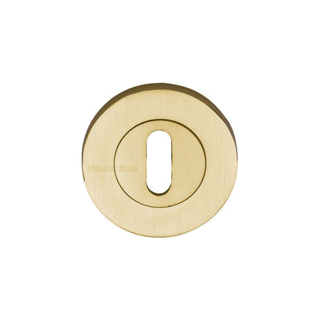 This is an image of a Heritage Brass - Key Escutcheon Satin Brass Finish, rs2000-sb that is available to order from T.H Wiggans Ironmongery in Kendal.