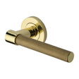 This is an image of a Heritage Brass - Door Handle Lever on Rose Phoenix Knurled Design Polished Brass Fin, rs2018-pb that is available to order from T.H Wiggans Ironmongery in Kendal.