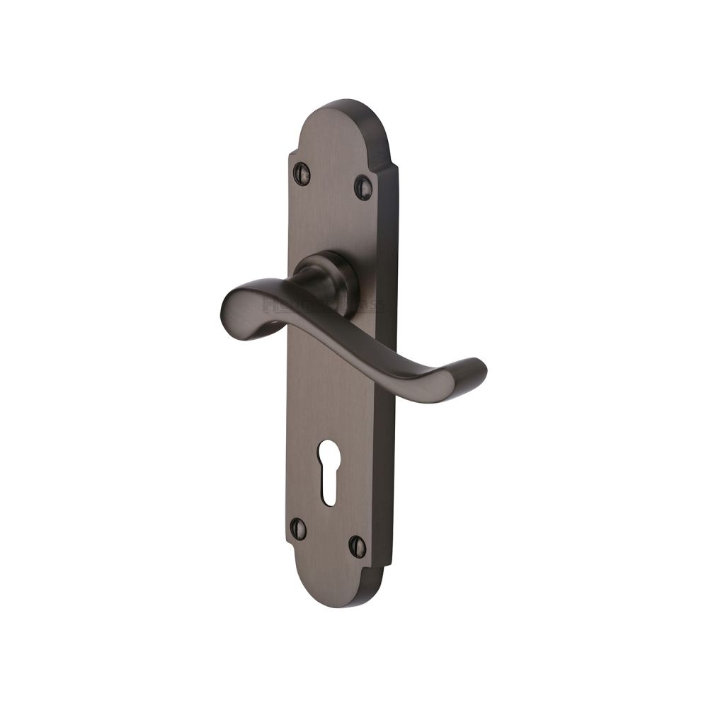 This is an image of a Heritage Brass - Door Handle Lever Lock Savoy Design Matt Bronze Finish, s600-mb that is available to order from T.H Wiggans Ironmongery in Kendal.