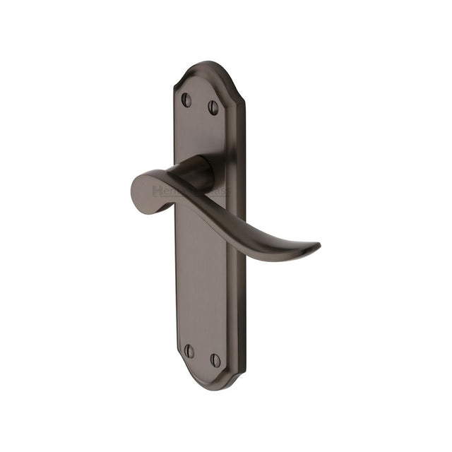 This is an image of a Heritage Brass - Door Handle Lever Latch Sandown Design Matt Bronze Finish, san1410-mb that is available to order from T.H Wiggans Ironmongery in Kendal.