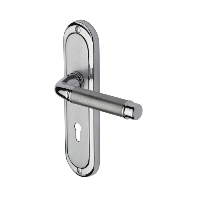 This is an image of a Heritage Brass - Door Handle Lever Lock Saturn Design Apollo Finish, sat1000-ap that is available to order from T.H Wiggans Ironmongery in Kendal.