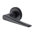 This is an image of a Sorrento - Door Handle Lever Latch on Round Rose Amalfi Design Matt Black Finish, sc-2059-blk that is available to order from T.H Wiggans Ironmongery in Kendal.
