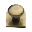 This is an image of a Heritage Brass - Cabinet Knob Victorian Round Design with Square Backplate 32mm, sq113-at that is available to order from T.H Wiggans Ironmongery in Kendal.