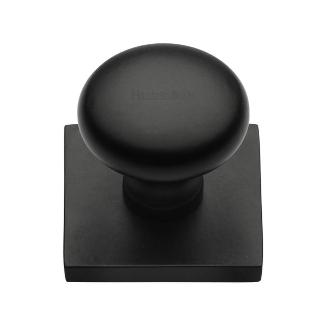 This is an image of a Heritage Brass - Cabinet Knob Victorian Round Design with Square Backplate 32mm, sq113-bkmt that is available to order from T.H Wiggans Ironmongery in Kendal.
